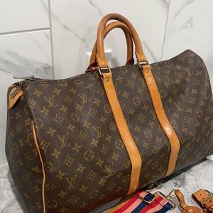 LOUIS VUITTON
Monogram Keepall 50 duffel travel bag 
Est. Retail $2,100.…
